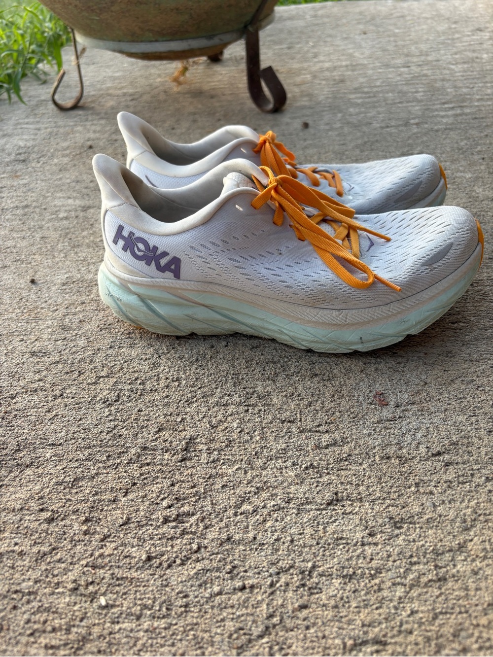 Hoka Women's Light Blue Running Shoes with Orange Laces